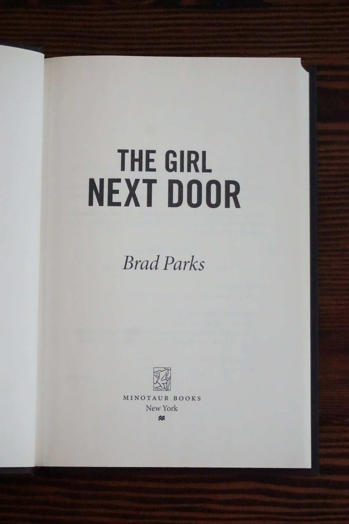 The Girl Next Door by Brad Parks 2012 First Edition Hardcover Carter Ross